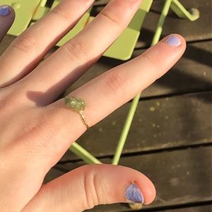 Green stone gold ring